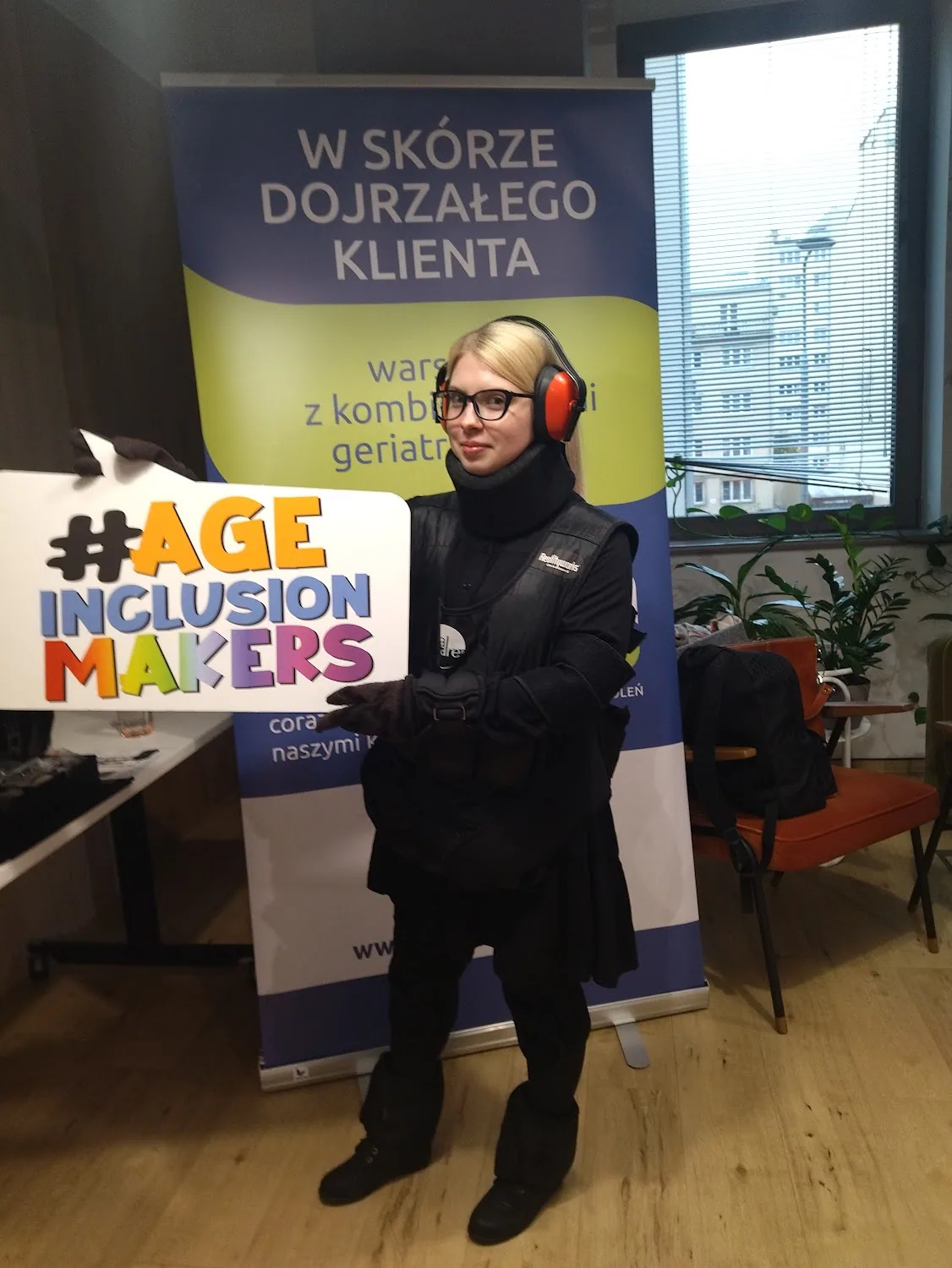 Wearing an age-simulation suit during an age-inclusion accessibility workshop